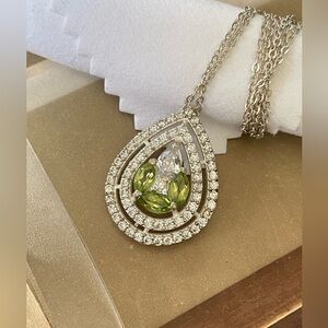 925 Sterling Silver Pear shape Pendent with Peridots and Diamond Mossanites!